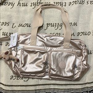 Rose gold Kipling purse